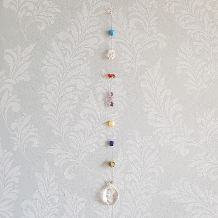 Hanger met ovaalvormig kristal (facet geslepen)